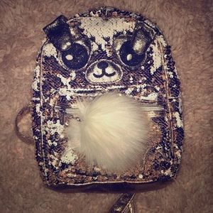 Reversible mini backpack